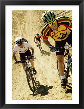 Framed Group of people riding bicycles in a race Print