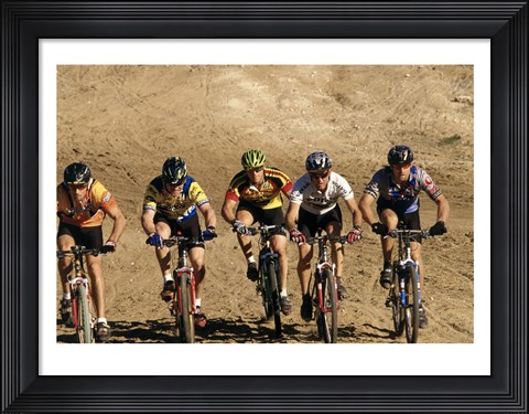 Framed Group of people riding bicycles in a race Print