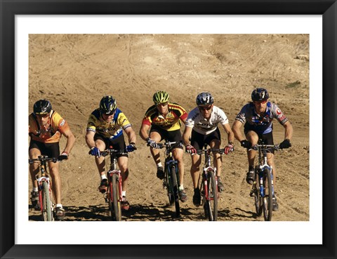 Framed Group of people riding bicycles in a race Print