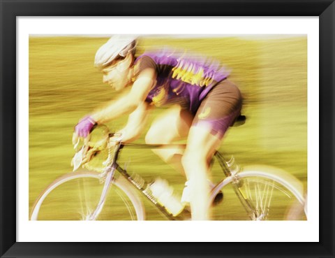 Framed Side profile of a young man cycling Print