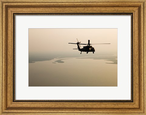 Framed Air Force helicopter flys over Lake Pontchatrain to New Orleans Print