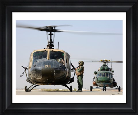 Framed Iraqi air force carries wounded warrior on aeromedical evacuation mission Print