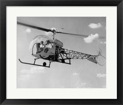 Framed Low angle view of two people sitting in a helicopter, Bell 47G-2 Print