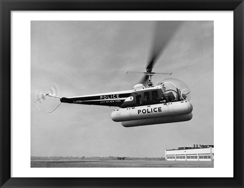 Framed Low angle view of a helicopter in flight, Bell 47-D, Bell Aircraft Corporation Print