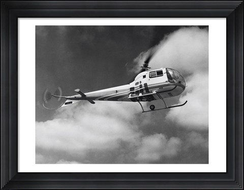Framed Low angle view of a helicopter in flight in the sky, Bell Helicopter Print