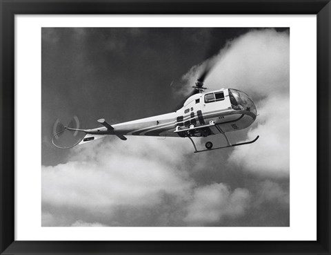 Framed Low angle view of a helicopter in flight in the sky, Bell Helicopter Print