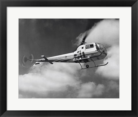 Framed Low angle view of a helicopter in flight in the sky, Bell Helicopter Print