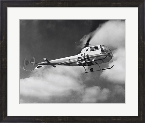 Framed Low angle view of a helicopter in flight in the sky, Bell Helicopter Print
