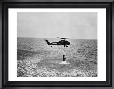 Framed Marine helicopter lifting the astronaut spacecraft out of the Ocean Print