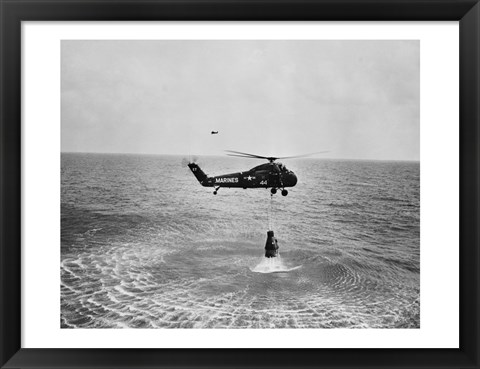 Framed Marine helicopter lifting the astronaut spacecraft out of the Ocean Print