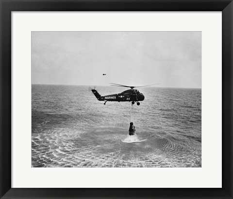 Framed Marine helicopter lifting the astronaut spacecraft out of the Ocean Print