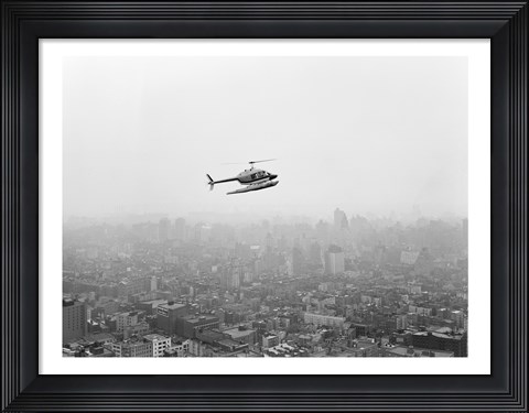 Framed USA, New York State, New York City, Helicopter over city Print