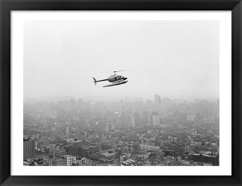 Framed USA, New York State, New York City, Helicopter over city Print