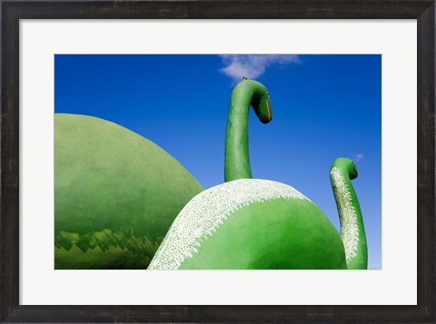 Framed Sculptures of two dinosaurs outside a rock shop, Holbrook, Route 66, Arizona, USA Print