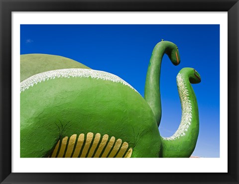 Framed Sculptures of two dinosaurs outside a rock shop, Holbrook, Route 66, Arizona, USA Print