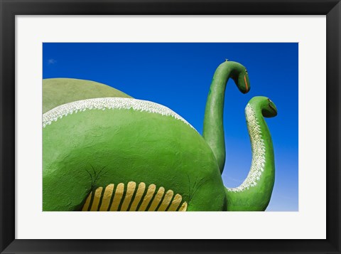 Framed Sculptures of two dinosaurs outside a rock shop, Holbrook, Route 66, Arizona, USA Print