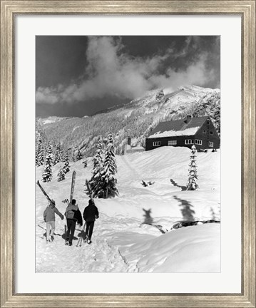 Framed USA, Washington state, three people carrying their skis Print