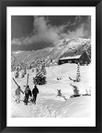 Framed USA, Washington state, three people carrying their skis Print