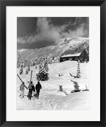 Framed USA, Washington state, three people carrying their skis Print