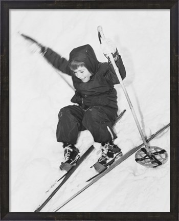 Framed Boy skiing on snow Print