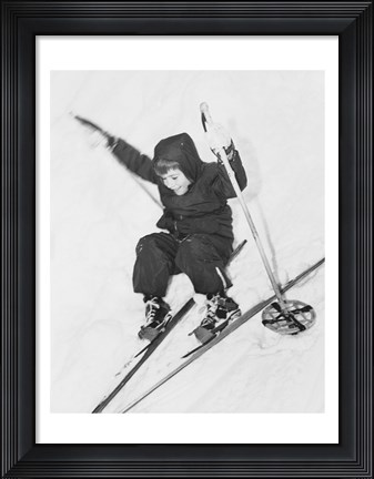 Framed Boy skiing on snow Print