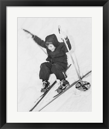 Framed Boy skiing on snow Print