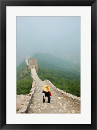 Framed Tourist climbing up steps on a wall, Great Wall of China, Beijing, China Print