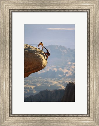 Framed Two hikers with ropes at the edge of a cliff 2 Print