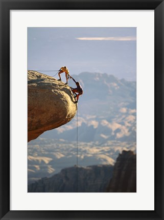 Framed Two hikers with ropes at the edge of a cliff 2 Print