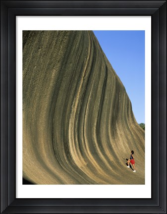 Framed Person climbing Wave Rock, Western Australia, Australia Print