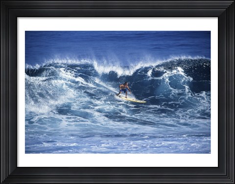 Framed Man Surfing off of the Coast of Hawaii Print