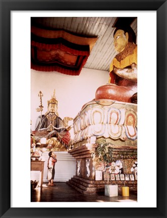 Framed Young Girl Praying in Front of a Giant Buddha Statue Print