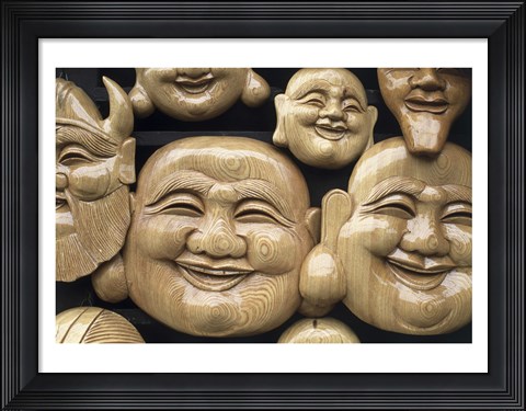 Framed Close-up of Faces of Laughing Buddha, Vietnam Print