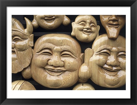 Framed Close-up of Faces of Laughing Buddha, Vietnam Print