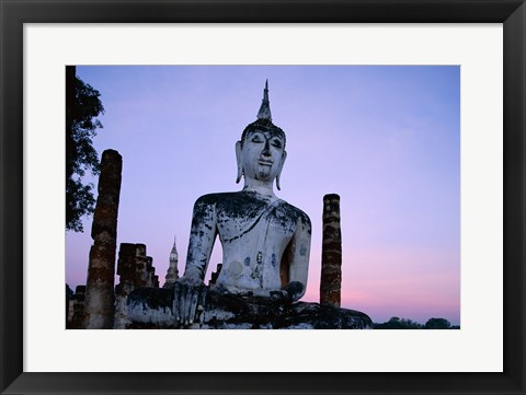 Framed Low angle view of the Seated Buddha, Wat Mahathat, Sukhothai, Thailand Print