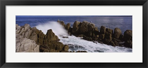 Framed Rock formations in water, Pebble Beach, California, USA Print