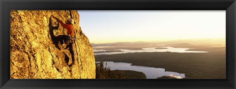 Framed Man climbing up a mountain, Rockchuck Peak, Grand Teton National Park, Wyoming, USA Print