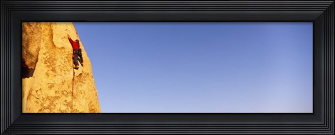 Framed Rear view of a woman climbing a mountain, Joshua Tree National Park, California, USA Print