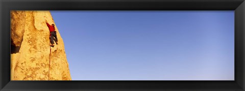 Framed Rear view of a woman climbing a mountain, Joshua Tree National Park, California, USA Print