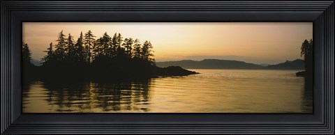 Framed Silhouette of trees in an island, Frederick Sound, Alaska, USA Print