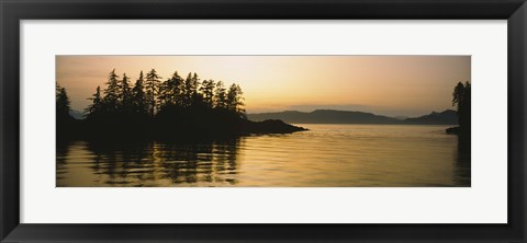 Framed Silhouette of trees in an island, Frederick Sound, Alaska, USA Print