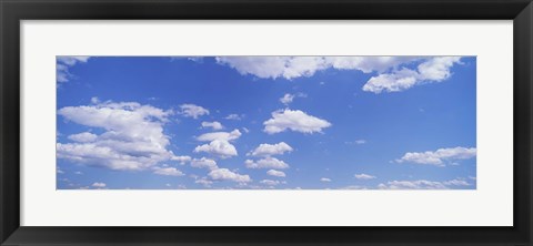 Framed White fluffy clouds Print
