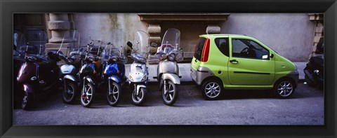 Framed Motor scooters with a car parked in a street, Florence, Italy Print