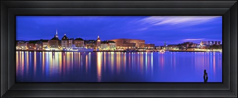 Framed Buildings at the waterfront lit up at dusk, Stockholm, Sweden Print