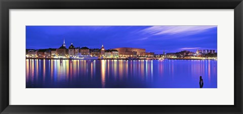 Framed Buildings at the waterfront lit up at dusk, Stockholm, Sweden Print