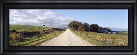 Framed Dirt road leading to a church, Iowa, USA Print