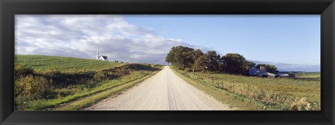 Framed Dirt road leading to a church, Iowa, USA Print