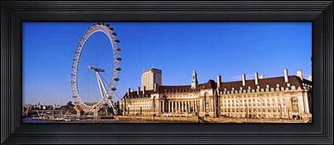 Framed Ferris wheel with buildings at the waterfront, River Thames, Millennium Wheel, London County Hall, London, England Print