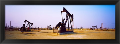 Framed Oil wells in oil field, California State Route 46, California, USA Print