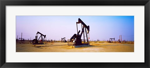 Framed Oil wells in oil field, California State Route 46, California, USA Print